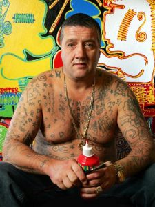 Exhibition of notorious criminal Mark 'Chopper' Read's rare paintings  arrives in Geelong
